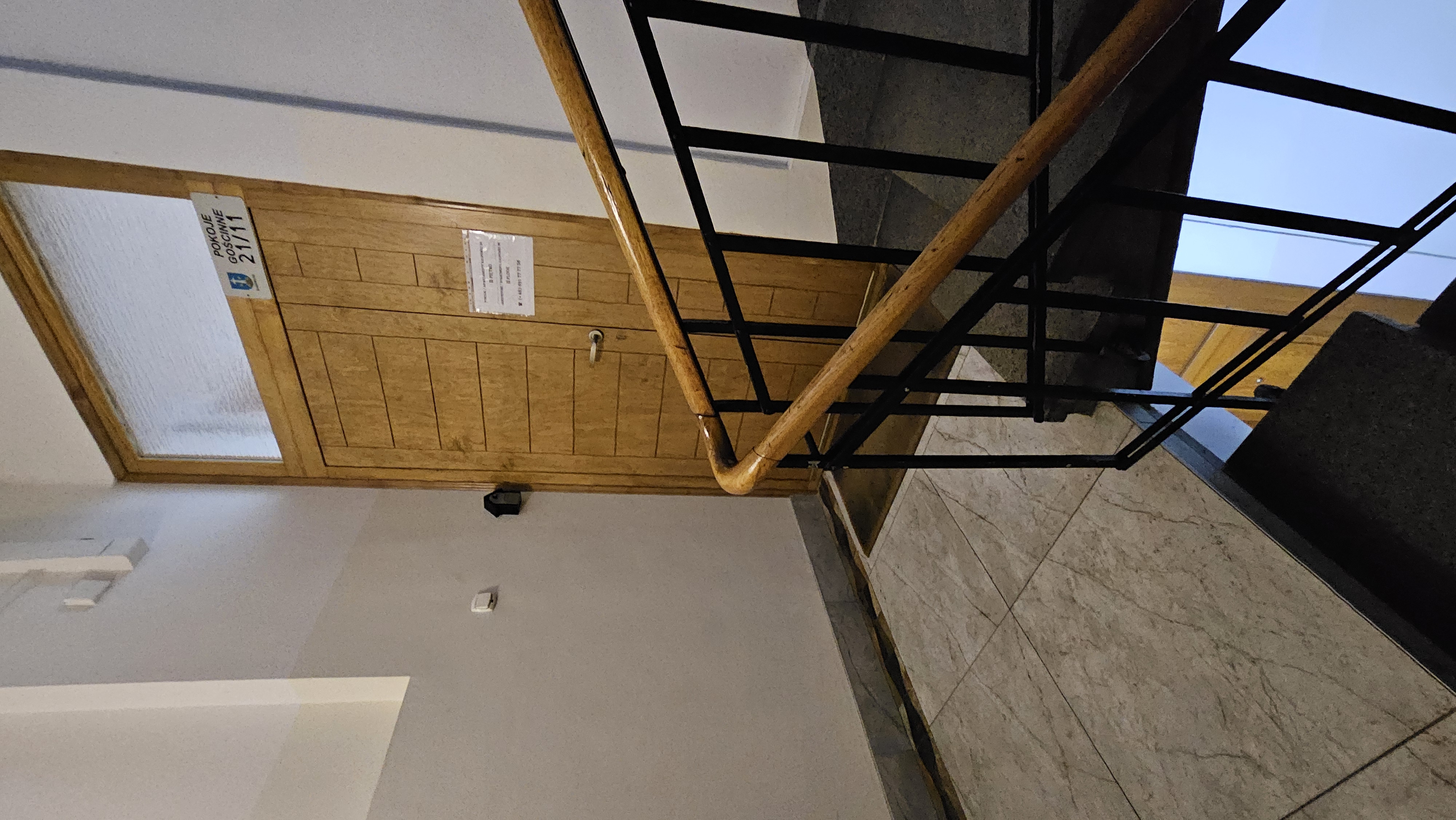 Head up the stairwell to the 2nd floor (European)